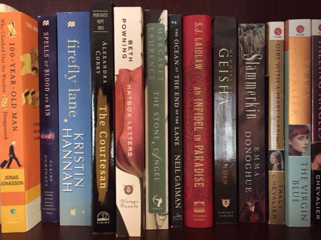 A number of titles on the book shelf of Book Time blogger including one that is coming on vacation - 100-year-old Man