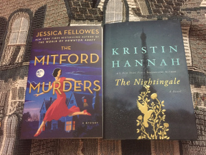 Front cover image of The Mitford Murders and The Nighingale on top of a blanket