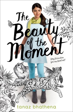 Front cover image of The Beauty of the Moment of an Indian teen with long dark hair in a ponytail surrounded by pencil drawings of a wolf, jaguar and flowers